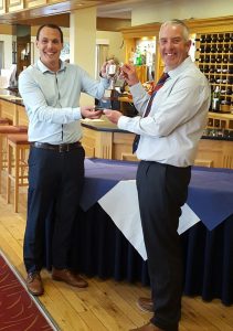 Mike Cartwright Greenkeepers Captain accepts the ClearWater Cup from Matthew Mears